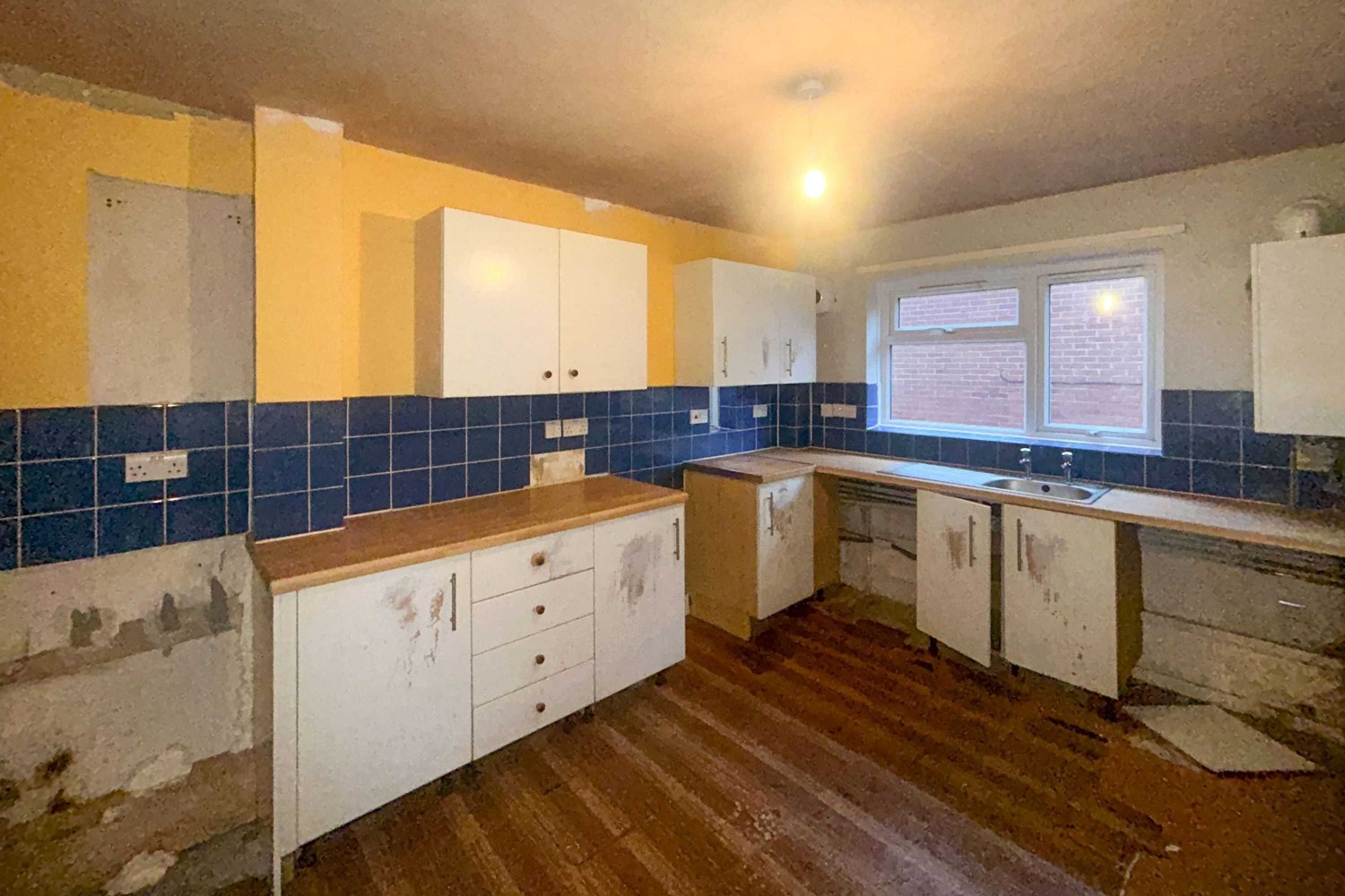 Kitchen (secondary view) before refurbishment